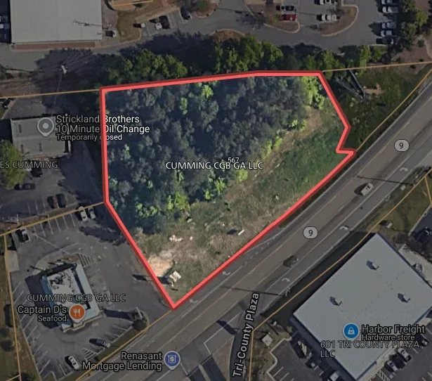 Aerial photo of a 1.42 acre parcel at 567 Atlanta Road in Cumming, Georgia, bought by Taco Bell of America