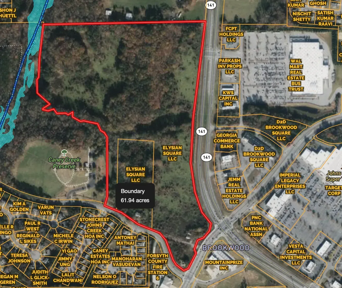 Aerial photo of a 61.94 acre tract at Brookwood Road and Caney Road on GA 141 in Forsyth County, Georgia, next to Caney Creek Preserve